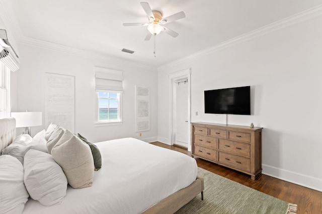 bedroom featuring ornamental molding, dark hardwood / wood-style flooring, and ceiling fan