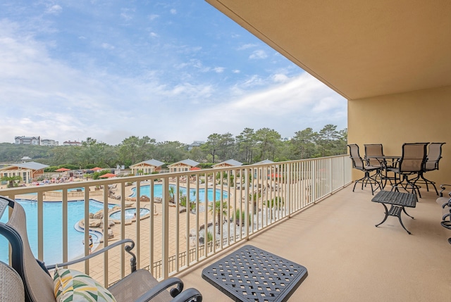 balcony with a community pool