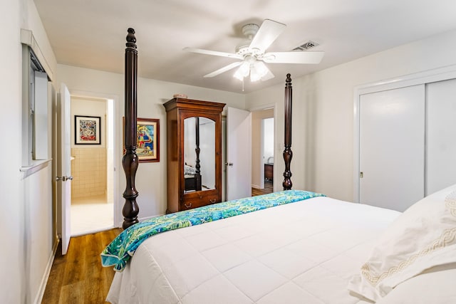 bedroom featuring hardwood / wood-style floors and ceiling fan