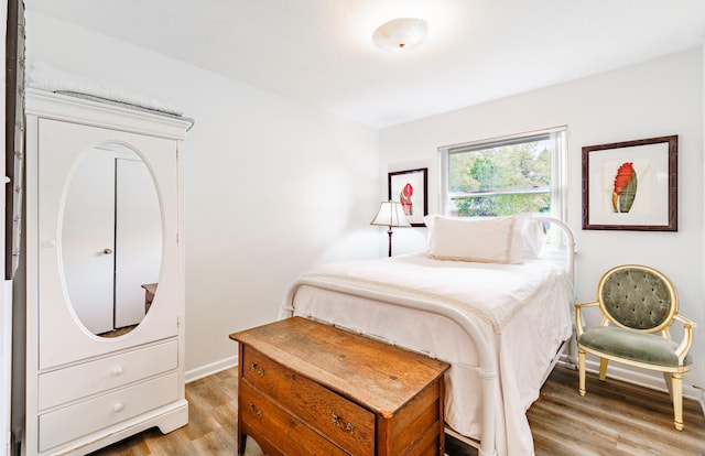 bedroom featuring hardwood / wood-style floors