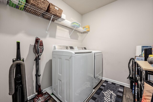 washroom with washing machine and dryer