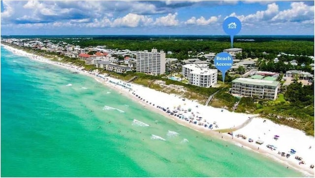 aerial view featuring a water view and a beach view