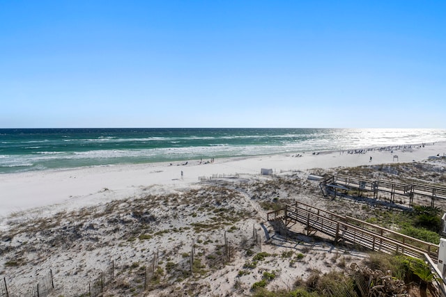 view of water feature with a beach view