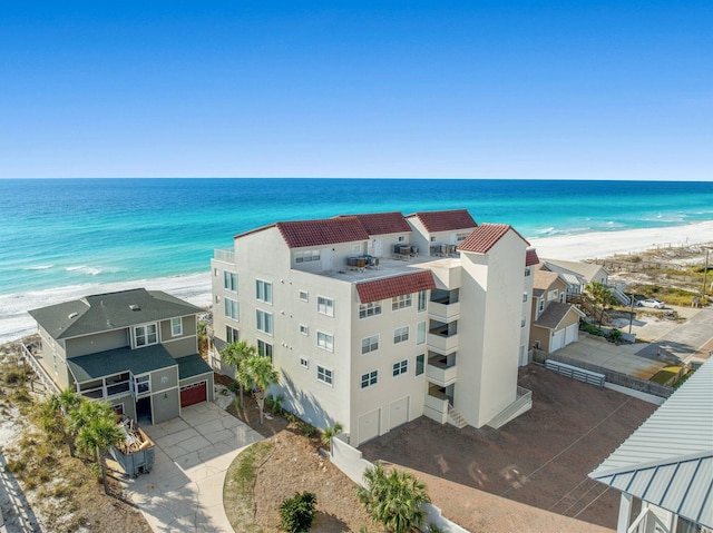 aerial view with a beach view and a water view