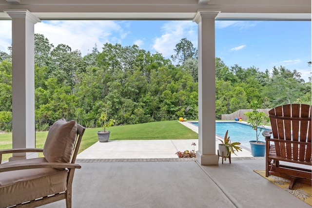 view of terrace with a fenced in pool