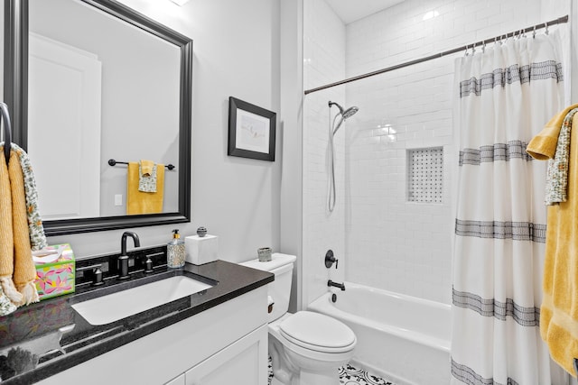 full bathroom featuring shower / bath combo with shower curtain, toilet, tile floors, and vanity