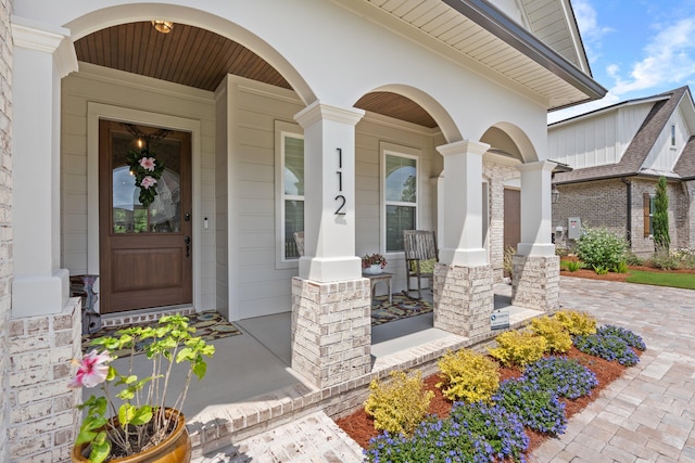 doorway to property with covered porch