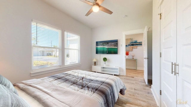 bedroom featuring light hardwood / wood-style flooring and ceiling fan