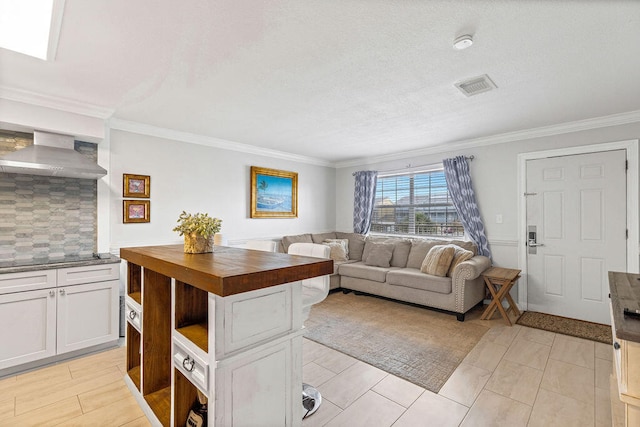 living room with crown molding