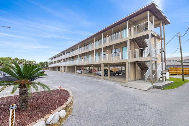 view of building exterior featuring a carport