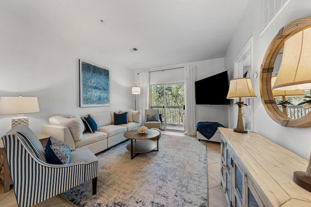 living room with light tile flooring