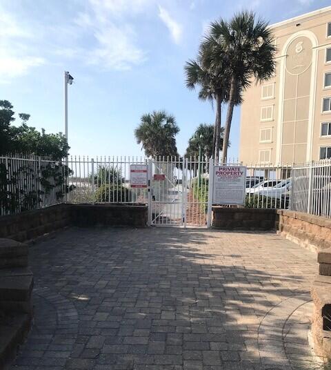 view of gate featuring fence