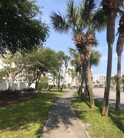 445 Gulf Shore Dr Unit 201, Destin, FL 32541 - view of community with a lawn