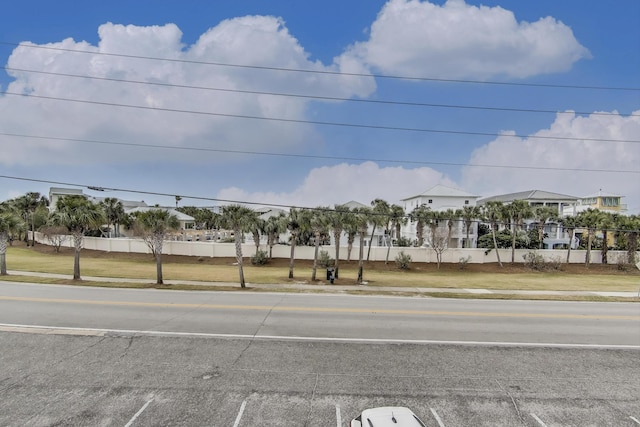 view of road featuring sidewalks and a residential view