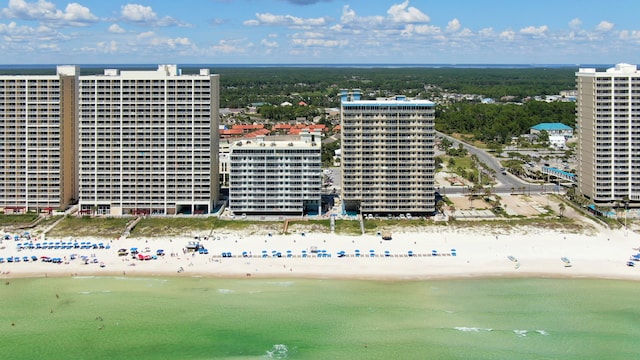 drone / aerial view with a view of the beach and a water view