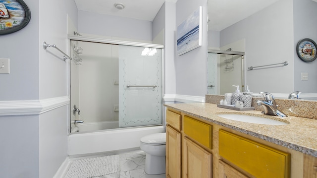 full bathroom with tile floors, toilet, shower / bath combination with glass door, and large vanity