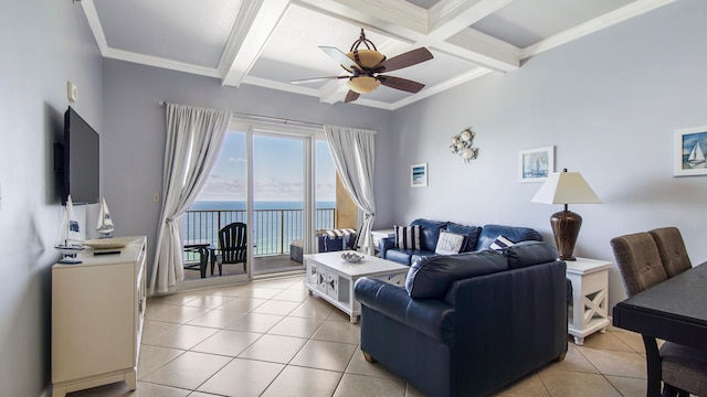 living room featuring beamed ceiling, ceiling fan, a water view, light tile flooring, and ornamental molding