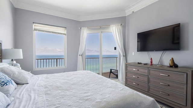 bedroom featuring ornamental molding, wood-type flooring, access to outside, and a water view