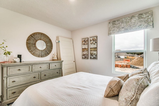 bedroom with a textured ceiling