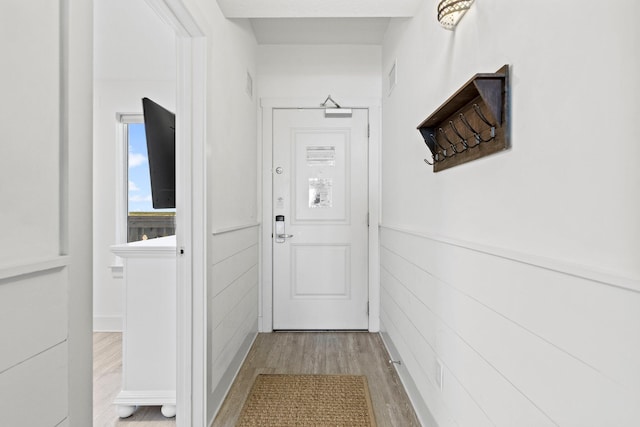 doorway to outside featuring light wood-type flooring