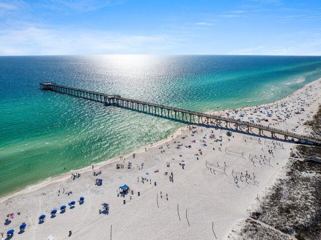 drone / aerial view with a view of the beach and a water view