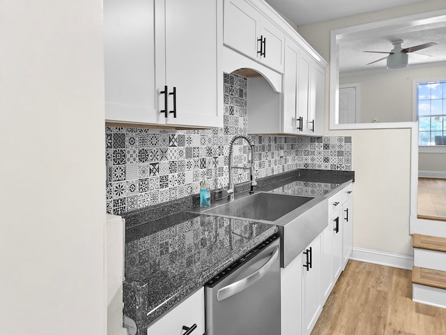 kitchen featuring ceiling fan, white cabinets, dishwasher, light wood-type flooring, and tasteful backsplash