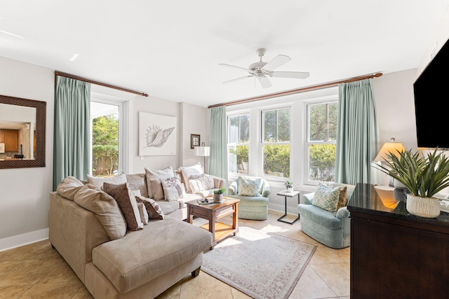 living room with ceiling fan and light tile floors