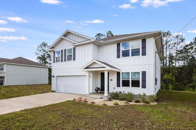 view of front of house with a garage and a front yard