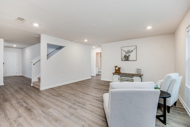 living area featuring wood-type flooring