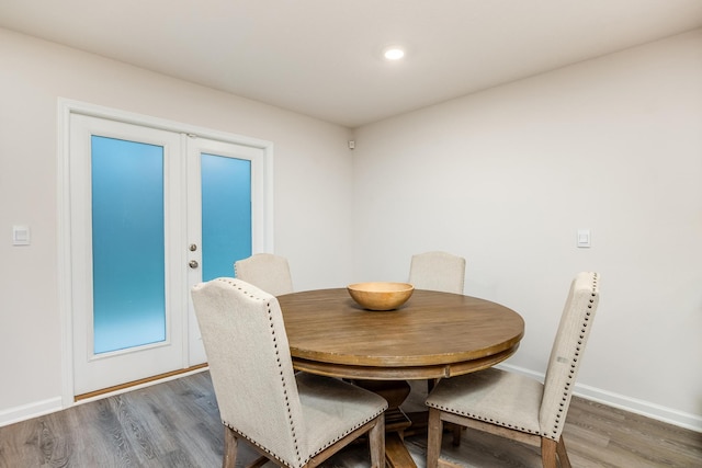 dining space featuring dark hardwood / wood-style floors