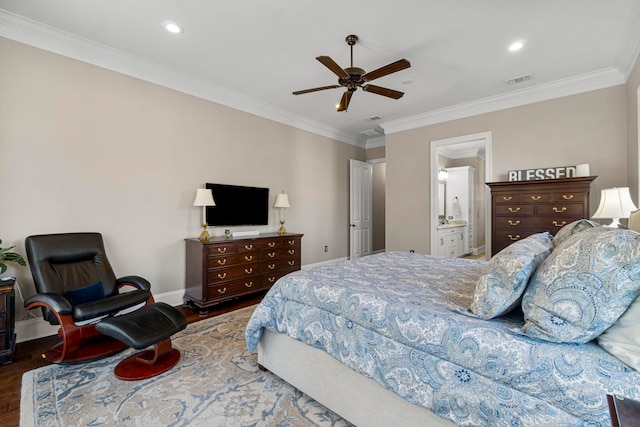 bedroom featuring ornamental molding, ceiling fan, hardwood / wood-style floors, and ensuite bathroom