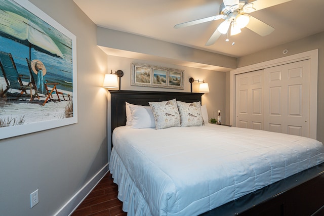 bedroom featuring a closet, ceiling fan, and dark hardwood / wood-style flooring