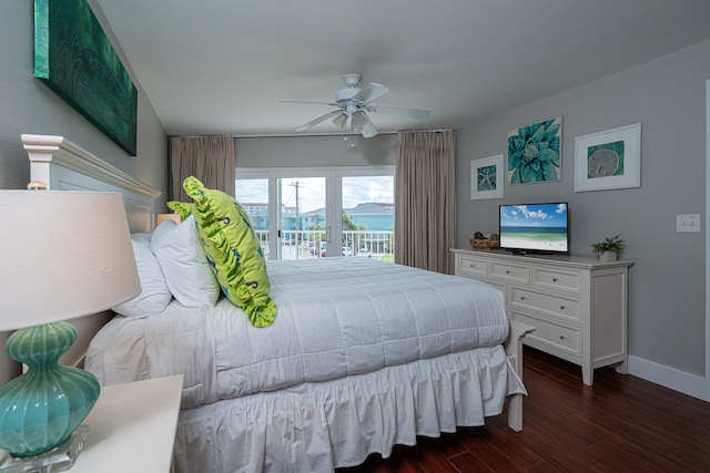 bedroom with ceiling fan, access to exterior, and dark wood-type flooring