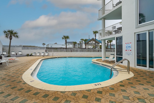 view of pool featuring a patio area