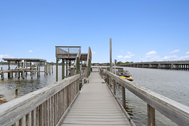 dock area with a water view