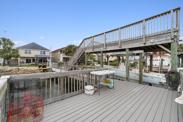 wooden deck featuring a boat dock