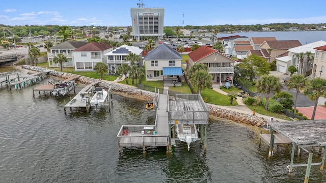 view of dock featuring a balcony and a water view