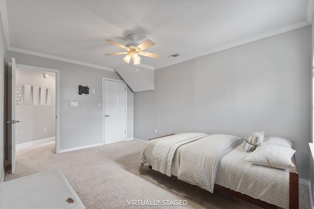 bedroom featuring ceiling fan, light carpet, and ornamental molding