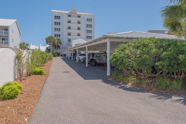 exterior space with a carport