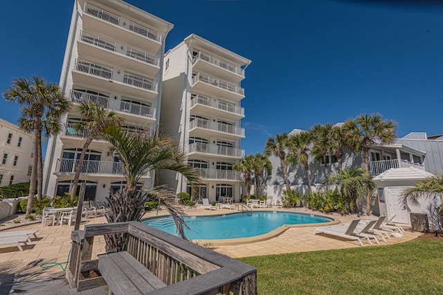 view of pool featuring a patio area