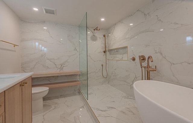 full bathroom featuring tile walls, vanity, toilet, and tile flooring