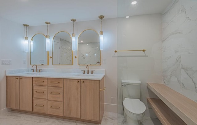 bathroom featuring tile walls, dual sinks, oversized vanity, toilet, and tile floors