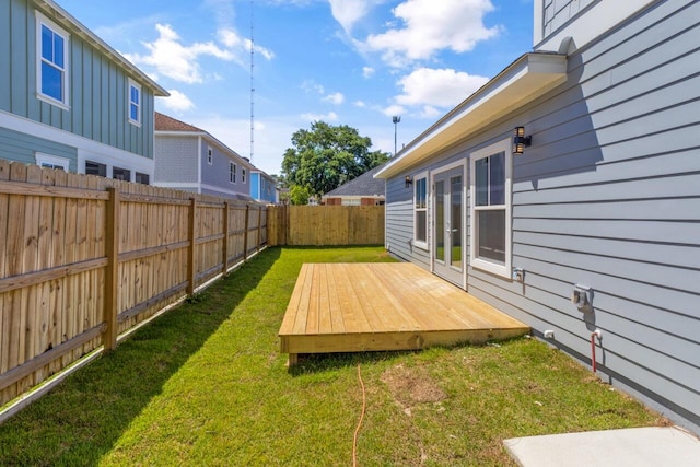 view of yard featuring a wooden deck