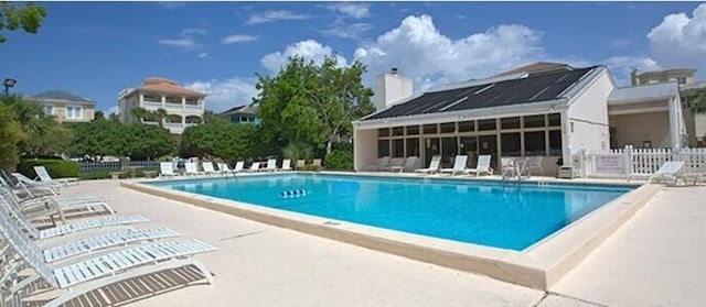 view of swimming pool featuring a patio