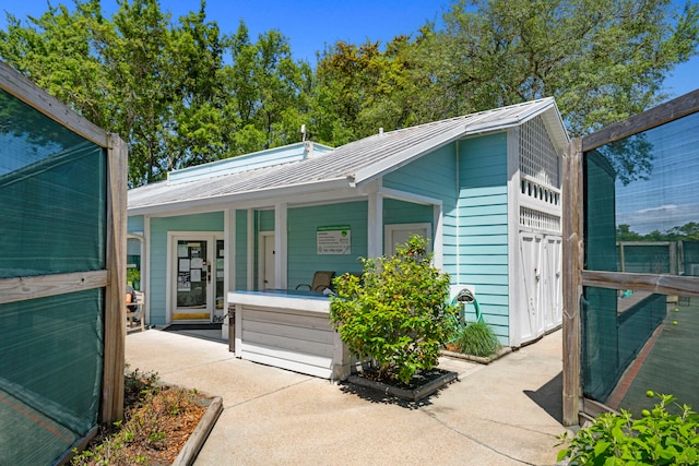 view of front of home with an outdoor structure