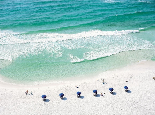 property view of water featuring a beach view