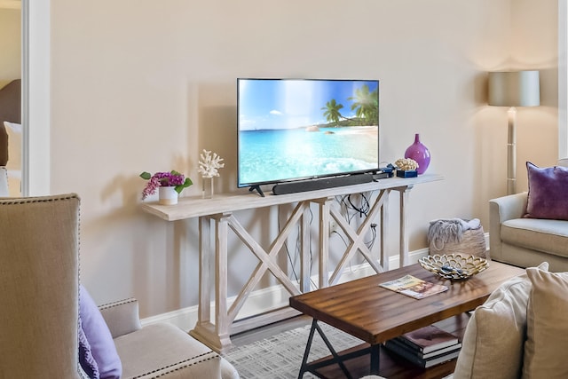 sitting room featuring light hardwood / wood-style flooring