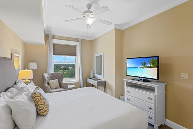 bedroom featuring ornamental molding and ceiling fan