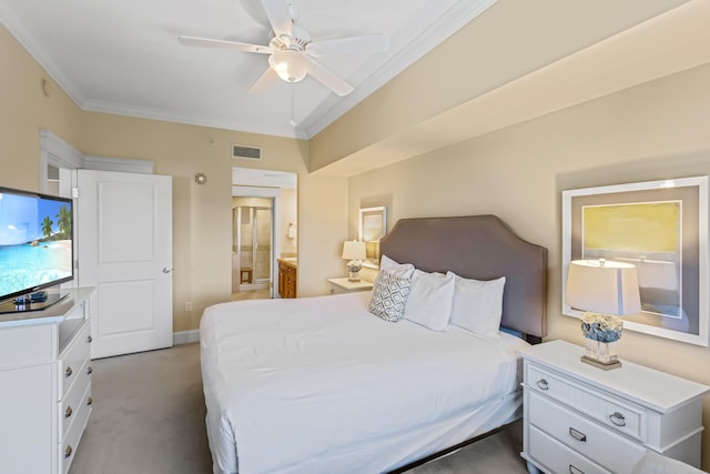 carpeted bedroom featuring ornamental molding, ceiling fan, and ensuite bathroom