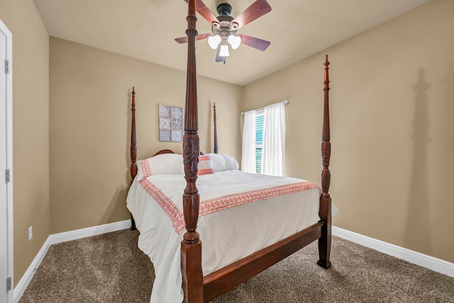 bedroom featuring dark colored carpet and ceiling fan